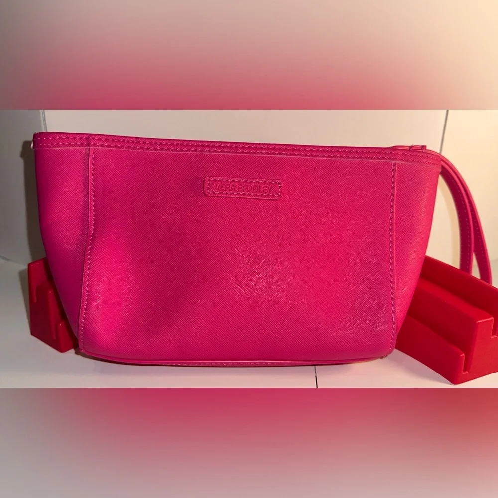 Vera Bradley Pink and White Laser Cut Floral Wristlet.